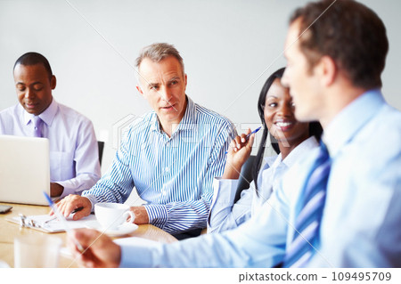 Business people, meeting and teamwork with planning, brainstorming and laptop in a workplace. Staff, group and manager with employees, cooperation and collaboration with project, idea or professional 109495709