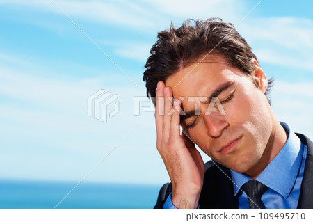 Headache, sky and face of business man sad, tired or stress over corporate mistake, company disaster or agency fail. Mockup space, migraine pain and closeup professional person depressed over crisis 109495710