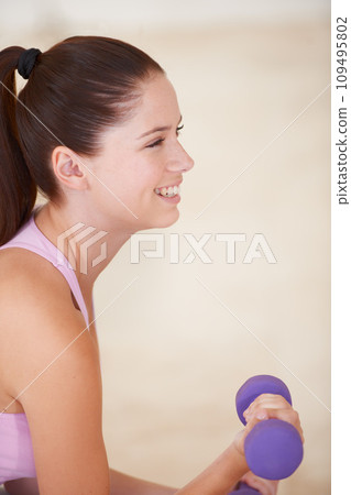 Woman, smile and dumbbell for exercise fitness routine, active performance for strength practice. Female person, weightlifting for health wellness challenge or muscle progress, strong for training 109495802