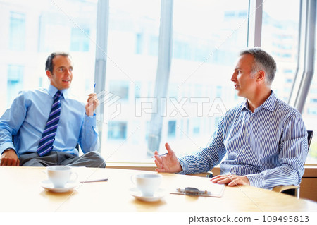 Meeting, conference room and business men in office for management conversation, talking and planning. Corporate workers, teamwork and people in boardroom for strategy, collaboration and working 109495813