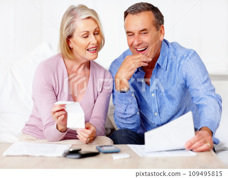 Home, financial and old couple with documents, taxes and mortgage debt with insurance checklist, savings and asset management. Apartment, senior woman or mature man with investment or retirement fund 109495815