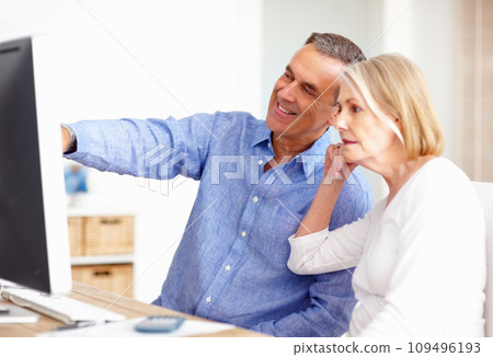 Investment, budget or senior couple with computer in home for retirement savings or pension planning. Banking, financial or mature man talking to a woman for house bills or profit growth on laptop Investment, budget or senior couple with computer in home for retirement savings or pension planning. Banking, financial or mature man talking to a woman for house bills or profit growth on laptop 109496193