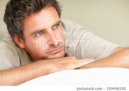 Thinking, relax and mature man in bed in the morning after nap, break or comfortable at home. Daydreaming, idea and male person from Canada wake up in bedroom for rest on cozy day in apartment. 109496208