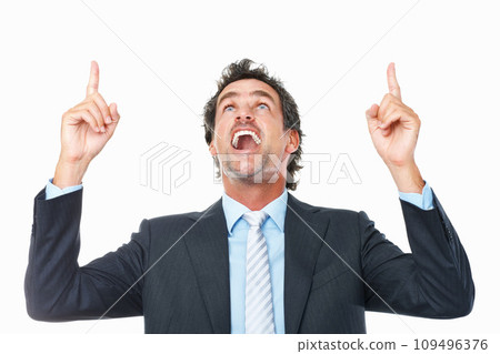 Business man, surprise and pointing up to space in studio for advertising crazy deal, promotion and information on white background. Wow, excited and mature entrepreneur show presentation of feedback Business man, surprise and pointing up to space in studio for advertising crazy deal, promotion and information on white background. Wow, excited and mature entrepreneur show presentation of feedback 109496376