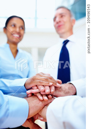 Business people, hands together and meeting in teamwork for motivation, unity or collaboration at office. Group of employees piling for building, diversity or support in community trust at workplace Business people, hands together and meeting in teamwork for motivation, unity or collaboration at office. Group of employees piling for building, diversity or support in community trust at workplace 109496543