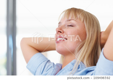 Smile, sleeping and young woman on sofa with positive, good and confident attitude for peace. Happy, relax and female person from Australia taking nap on couch in the living room at modern apartment. 109496592