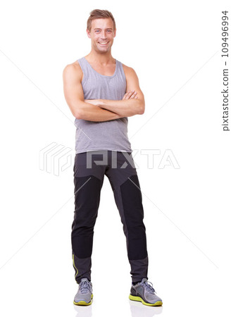 Portrait, man and confident for fitness, studio and happy with training wellness in gym clothes. Person, pride and smile face with commitment to health body, exercise and relax by white background Portrait, man and confident for fitness, studio and happy with training wellness in gym clothes. Person, pride and smile face with commitment to health body, exercise and relax by white background 109496994