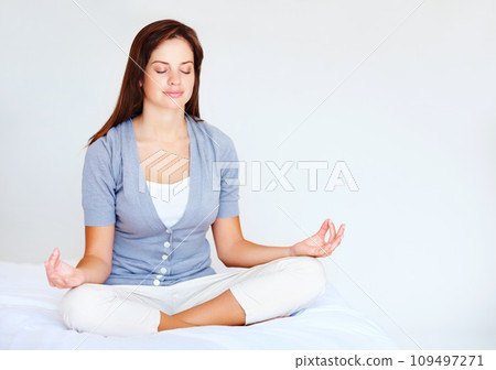 Yoga, meditation and woman in bedroom with peace and spiritual zen in morning from breathing. Calm, lotus and mindfulness exercise in home with person to relax or benefits of self care in mockup Yoga, meditation and woman in bedroom with peace and spiritual zen in morning from breathing. Calm, lotus and mindfulness exercise in home with person to relax or benefits of self care in mockup 109497271