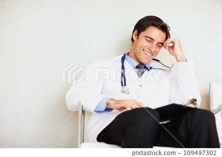 Clipboard, happiness and relax man, doctor or surgeon reading medical report, hospital info or medicine notes. Mockup wall space, checklist and professional expert check clinic healthcare paperwork 109497302