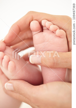 Woman, child and feet closeup for holding love or childhood bonding, motherhood or newborn. Female person, infant and toes or care support for kid growth development, parent trust or nurture youth Woman, child and feet closeup for holding love or childhood bonding, motherhood or newborn. Female person, infant and toes or care support for kid growth development, parent trust or nurture youth 109497369
