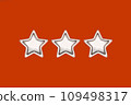 Christmas three five pointed golden stars on red background. Christmas decoration. 109498317