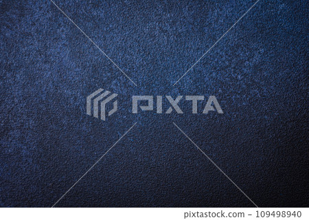 Texture of a concrete wall with cracks and scratches which can be used as a background Texture of a concrete wall with cracks and scratches which can be used as a background 109498940