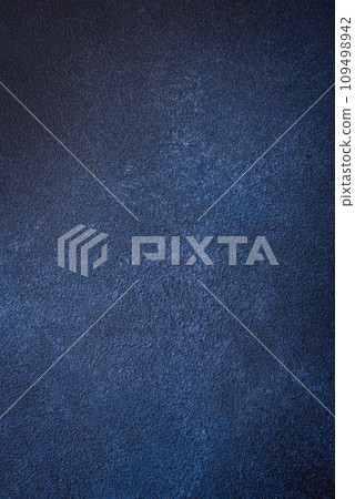 Texture of a concrete wall with cracks and scratches which can be used as a background Texture of a concrete wall with cracks and scratches which can be used as a background 109498942