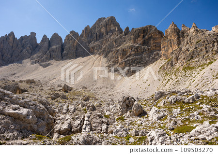 Rugged mountain landscape with rocky pinnacles of Paternkofel in Dolomites Rugged mountain landscape with rocky pinnacles of Paternkofel in Dolomites 109503270