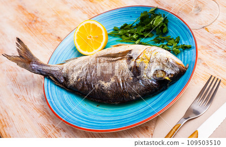 Smoked dorada with lemon Smoked dorada with lemon 109503510
