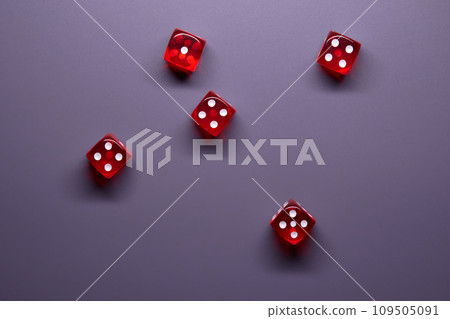 Red dices on grey background. Copy space. Red dices on grey background. Copy space. 109505091