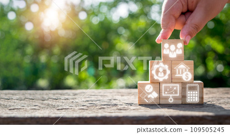 ESOP, Employee stock ownership plan concept, Man hand holding wooden block with employee stock ownership plan icon on virtual screen, business, financial, investment, economy. 109505245
