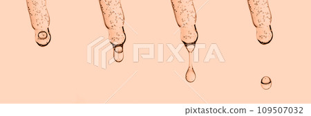 A banner with several pipettes with serum or other cosmetic product. Peach Fuzz 109507032