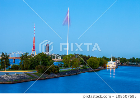 Riga's skyline at blue hour, featuring the large flagpole and the TV tower Riga's skyline at blue hour, featuring the large flagpole and the TV tower 109507693