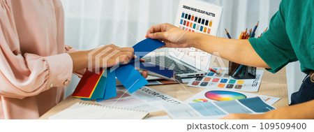 Interior designer choose appropriate color from color palette. Variegated 109509400