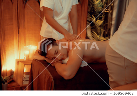 Caucasian man customer enjoying relaxing anti-stress massage. Quiescent Caucasian man customer enjoying relaxing anti-stress massage. Quiescent 109509402