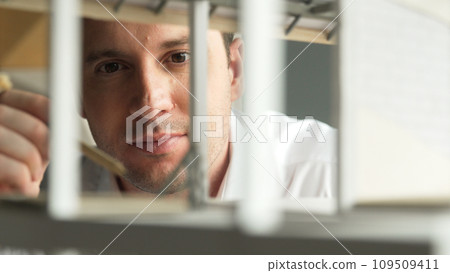 Closeup image of caucasian engineer inspect house construction. Manipulator. 109509411