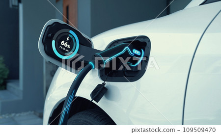 EV charger from home charging station recharging electric car. Peruse 109509470