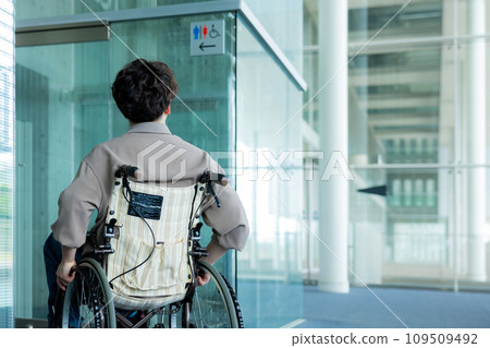 young man in a wheelchair young man in a wheelchair 109509492