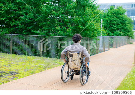young man in a wheelchair young man in a wheelchair 109509506