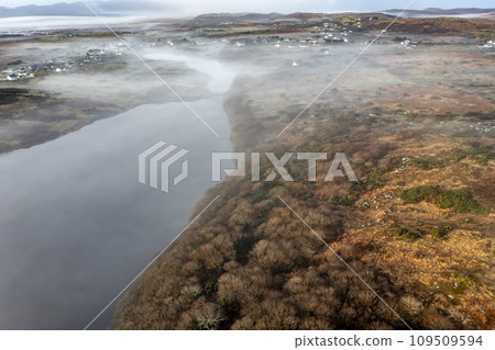 Aerial view of Lough fad in the morning fog, County Donegal, Republic of Ireland 109509594