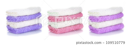 set of colored towels isolated on a white background set of colored towels isolated on a white background 109510779