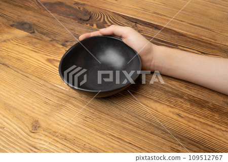 Bowl in Hands, Empty Bowl in Arms on Wooden Background, Vintage Kitchen Tableware Mockup Bowl in Hands, Empty Bowl in Arms on Wooden Background, Vintage Kitchen Tableware Mockup 109512767