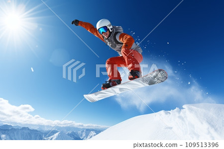 Flying snowboarder on blue sky background. Flying snowboarder on blue sky background. 109513396