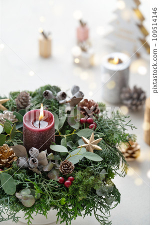 Christmas wreath and candles white background Christmas wreath and candles white background 109514146