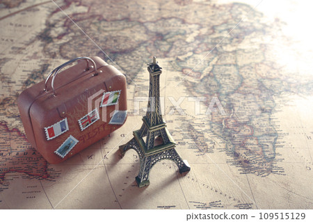 An image of traveling abroad using a world map, airplane, and model of the Eiffel Tower An image of traveling abroad using a world map, airplane, and model of the Eiffel Tower 109515129