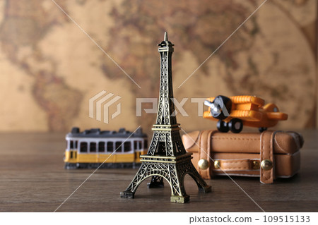 An image of traveling abroad using a world map, airplane, and model of the Eiffel Tower An image of traveling abroad using a world map, airplane, and model of the Eiffel Tower 109515133