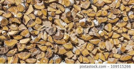 Chopped and stacked pile of pine and birch wood. Texture, background Chopped and stacked pile of pine and birch wood. Texture, background 109515266