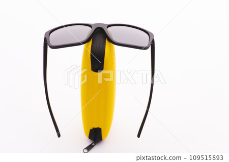 Vintage sunglasses with black plastic frame on white background 109515893