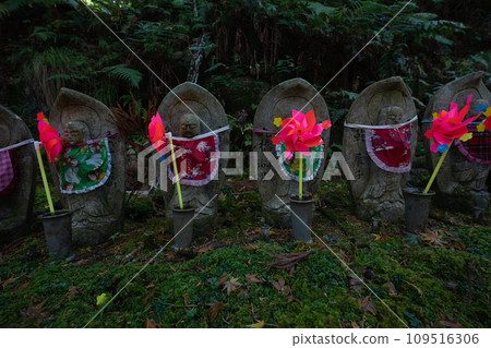 A cute Jizo statue that is loved by the common people and watches over the area. A cute Jizo statue that is loved by the common people and watches over the area. 109516306