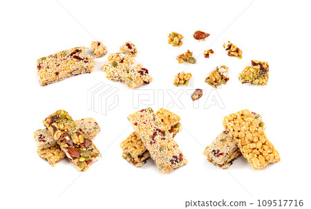 Energy Snack with Nuts Isolated. Muesli Snack, Protein Candy, Fitness Fruit and Nut Mix Energy Snack with Nuts Isolated. Muesli Snack, Protein Candy, Fitness Fruit and Nut Mix 109517716