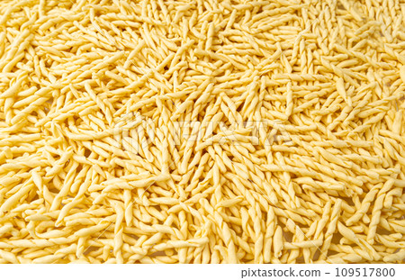 Raw Trofie Pasta, Dry Italian Macaroni, Traditional Genoa Food, Raw Noodle, Modern Ligurian Cuisine Raw Trofie Pasta, Dry Italian Macaroni, Traditional Genoa Food, Raw Noodle, Modern Ligurian Cuisine 109517800
