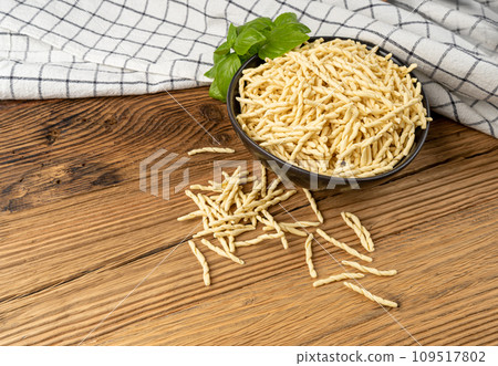 Raw Trofie Pasta, Dry Italian Macaroni, Traditional Genoa Food, Raw Noodle, Modern Ligurian Cuisine Raw Trofie Pasta, Dry Italian Macaroni, Traditional Genoa Food, Raw Noodle, Modern Ligurian Cuisine 109517802