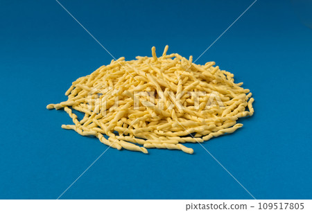 Raw Trofie Pasta, Dry Italian Macaroni, Traditional Genoa Food, Raw Noodle, Modern Ligurian Cuisine Raw Trofie Pasta, Dry Italian Macaroni, Traditional Genoa Food, Raw Noodle, Modern Ligurian Cuisine 109517805