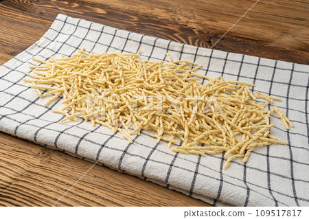 Raw Trofie Pasta, Dry Italian Macaroni, Traditional Genoa Food, Raw Noodle, Modern Ligurian Cuisine 109517817