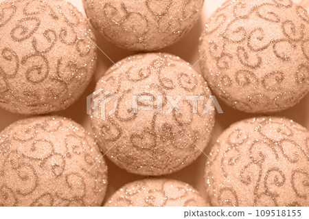 Christmas Peach Fuzz background. Trendy Color of the year 2024 Peach Fuzz. Beautiful Christmas Wallpaper. Christmas Peach Fuzz background. Trendy Color of the year 2024 Peach Fuzz. Beautiful Christmas Wallpaper. 109518155