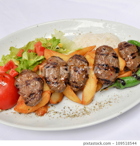 Meatball balls from traditional Turkish cuisine dishes, grilled meatballs, Turkish izgara kofte Meatball balls from traditional Turkish cuisine dishes, grilled meatballs, Turkish izgara kofte 109518544