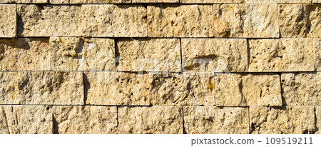 Cutting beige marble wall rectangular, seamless lined up Cutting beige marble wall rectangular, seamless lined up 109519211