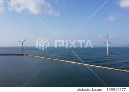 Wind power generation lined up on the sea Wind power generation lined up on the sea 109519677
