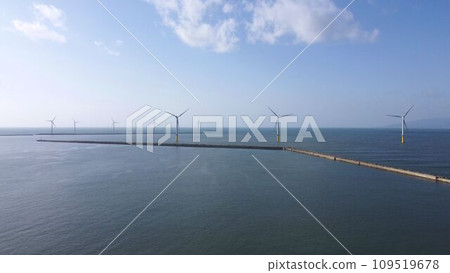 Wind power generation lined up on the sea Wind power generation lined up on the sea 109519678