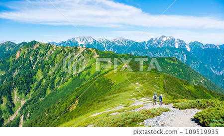 Climbing Mt. Jigatake in summer (view from Taneike Sanso to Mt. Jigatake south peak towards Mt. Tateyama and Mt. Tsurugidake) 109519935